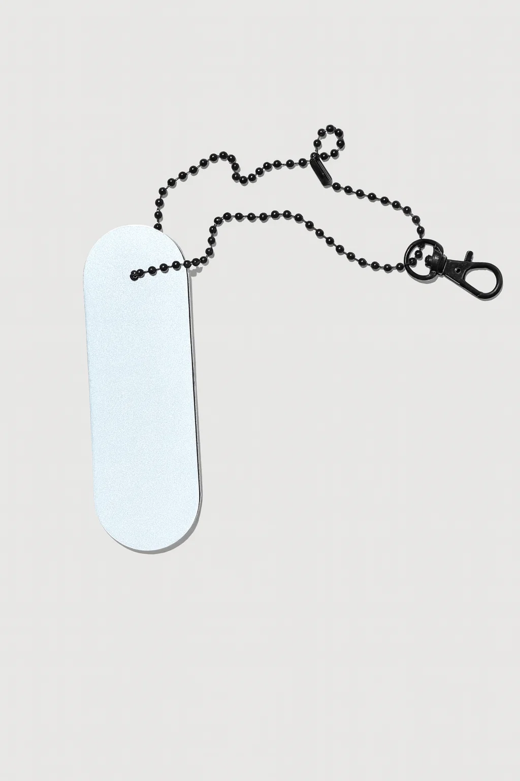 Minkštas atšvaitas pakabukas pilkas